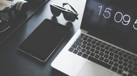 Desk with mobile and laptop